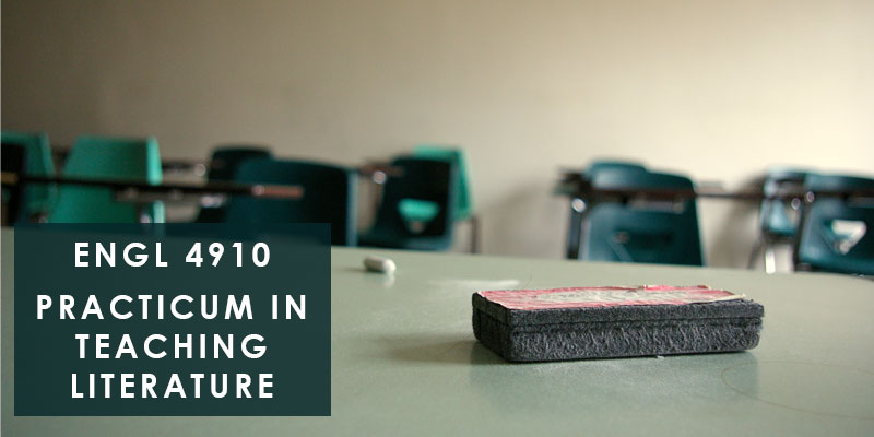 photo of chalk and eraser sitting on desk in classroom