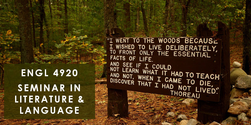 wooden sign with Thoreau quote in forest