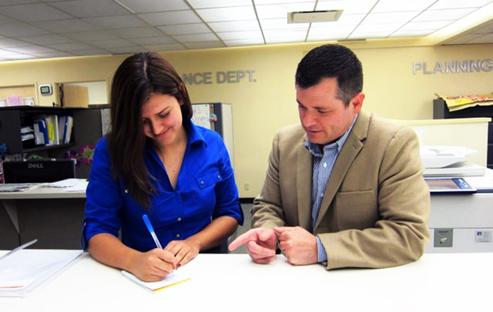 Cal State L.A. student Laura Lozano was mentored by alumnus Sergio Gonzales during the Job Shadowing Program.