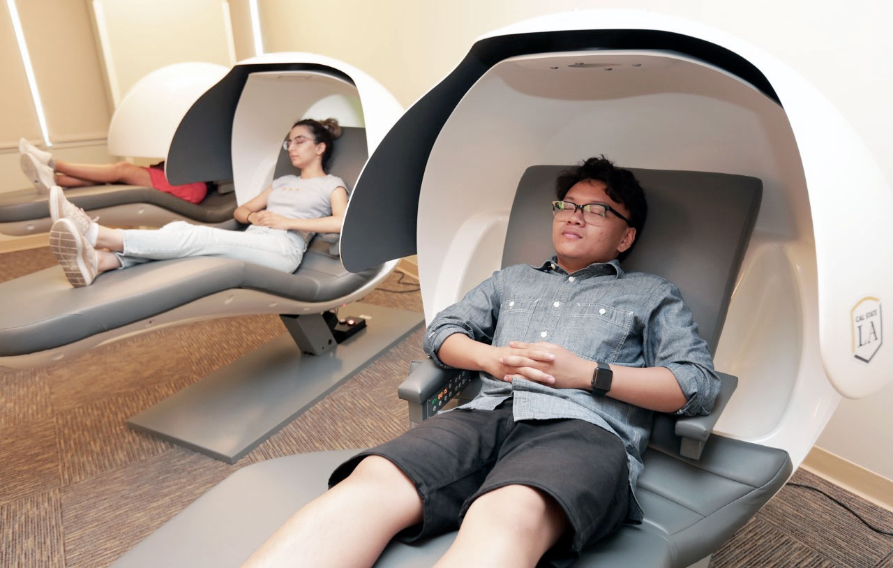 Students sitting in Relaxation Pods