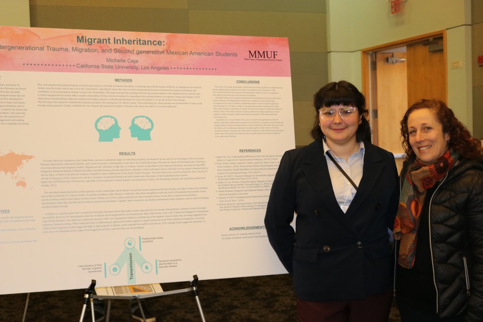 Student and professor in front of posterboard 