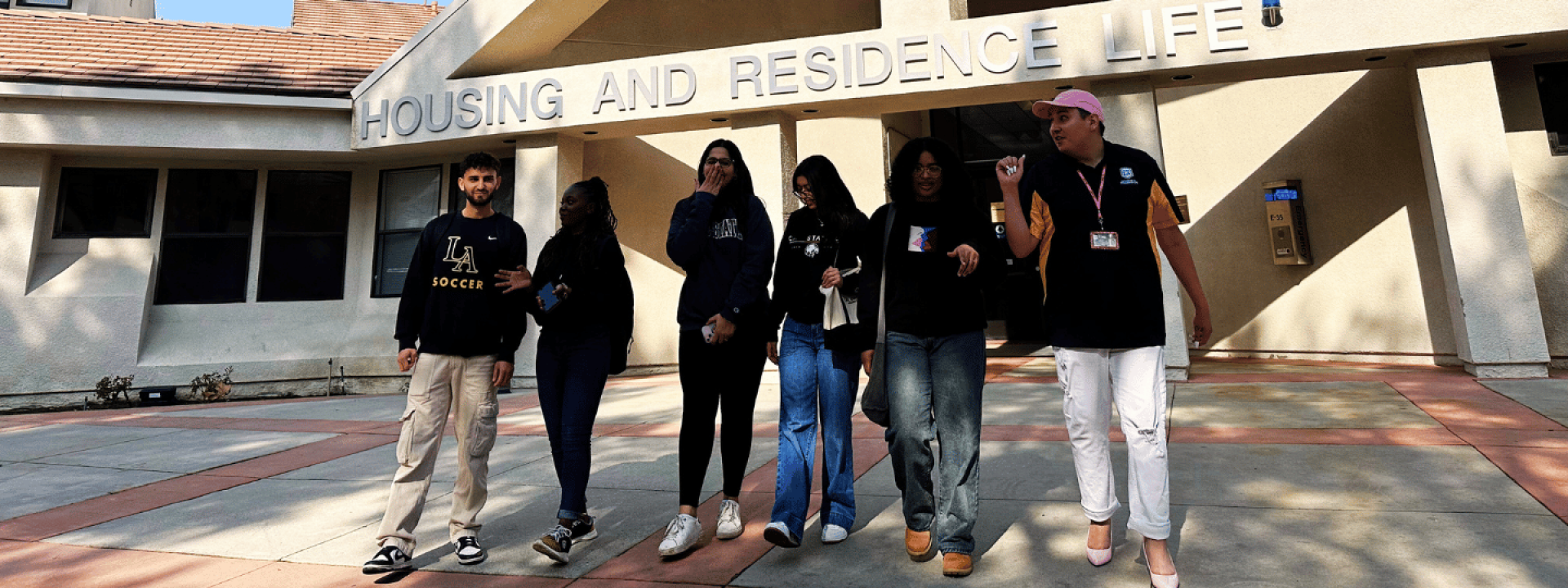 Cal State LA residents in front of Housing.