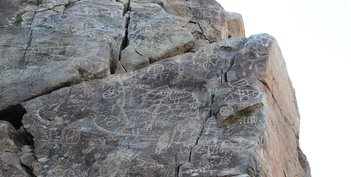 Rock formations with art work carved onto them