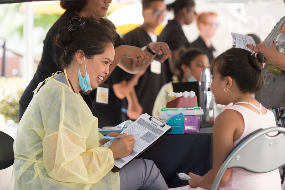 ECHO team and U.S.C. dentist at community event