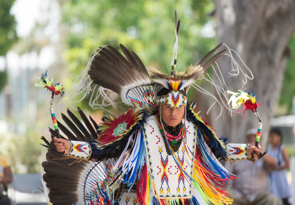 Native American dancer performing in regalia 