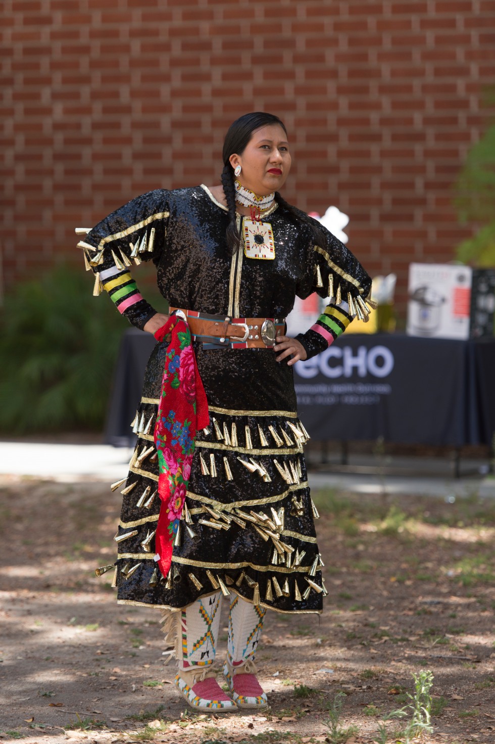 Native American women in regalia performing a sacred dance for the ECHO-A.I.A.N. event  