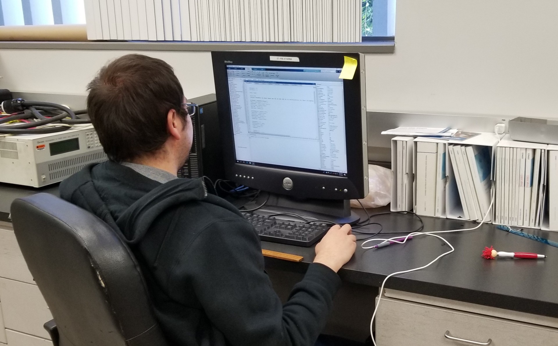 A student working with MATLAB