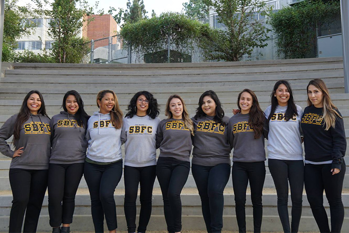 Students wearing sweatshirts with SBFC on them