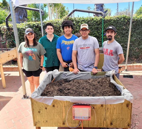 BOOST students with gardening project