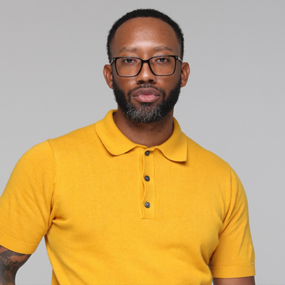 Everett Swain wearing a yellow polo shirt