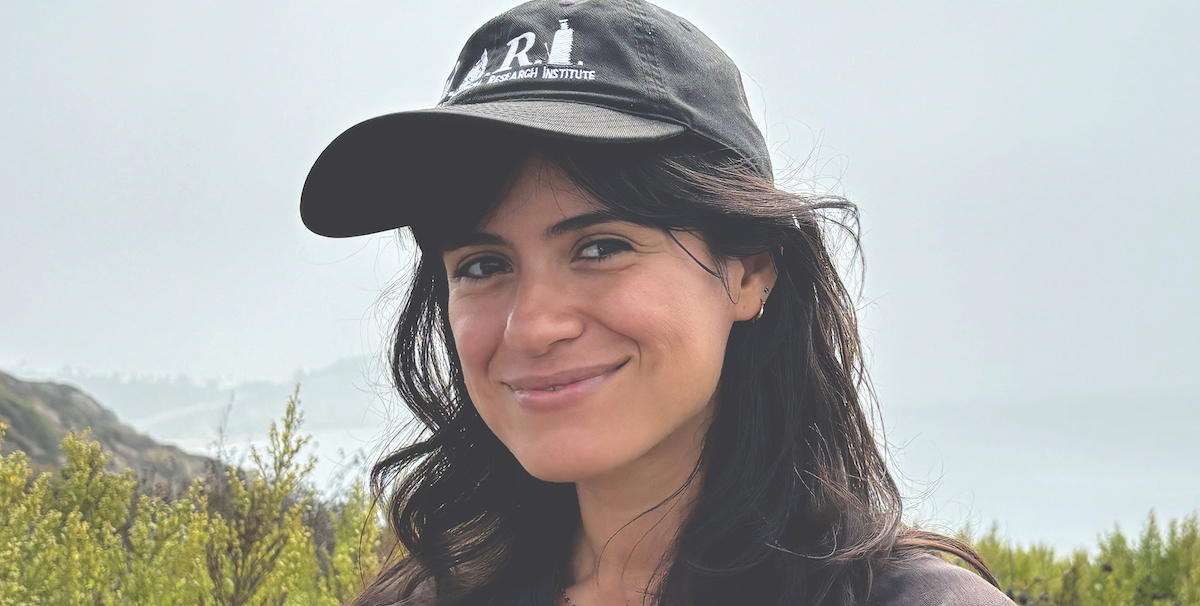 Jennifer Leiva wearing a baseball cap