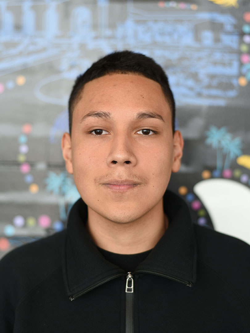 A person with short hair.