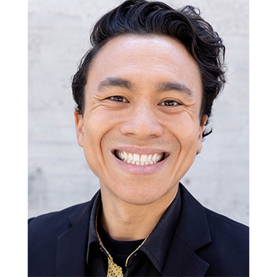 Mas Moriya smiling in their headshot