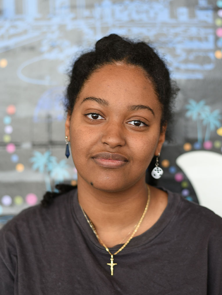 A person with their hair pulled back.