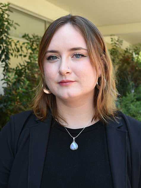 A person with shoulder-length hair.