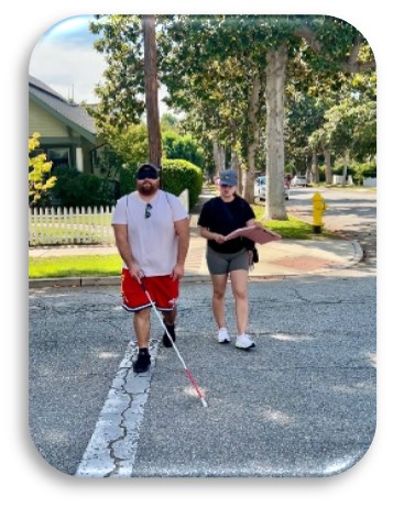 two people crossing street