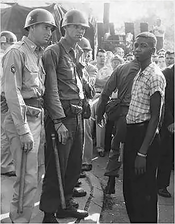 A 15-year-old Terrence Roberts is turned away from Central High School by members of the National Guard. (Photo courtesy Central High School Museum Historical Collections/UALR Archives)