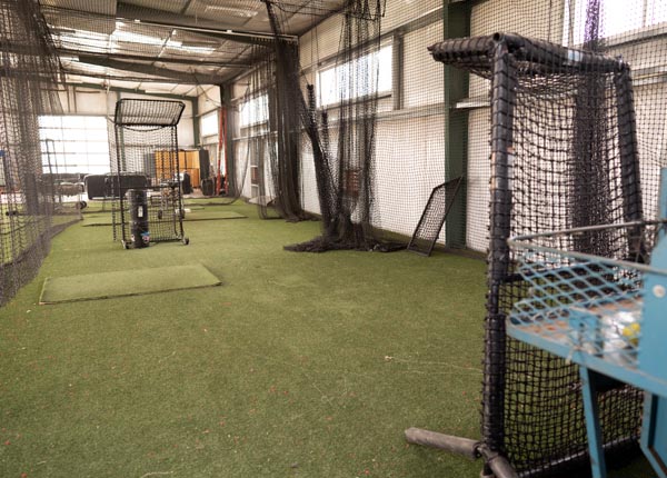 The inside of a batting cage.