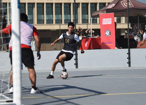 Student playing soccer.