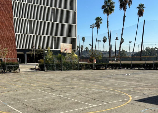 An outdoor basketball court.