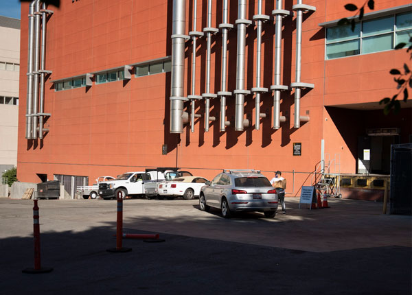 Vehicles in front of a loading dock.