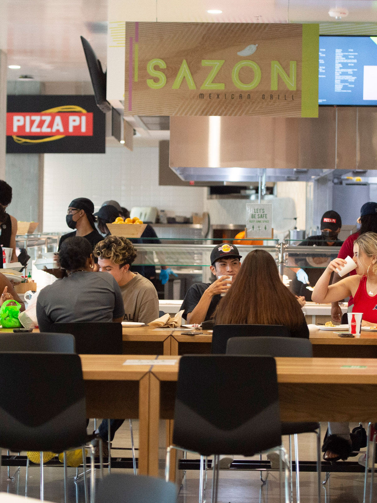 Student eating together in a dining hall.