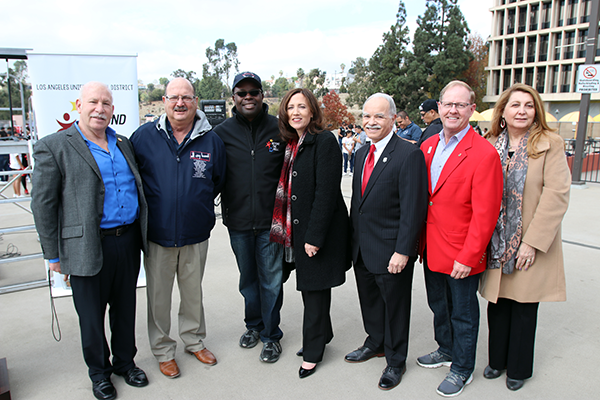 President Covino and dignitaries at All City Honor Marching Band ceremony.