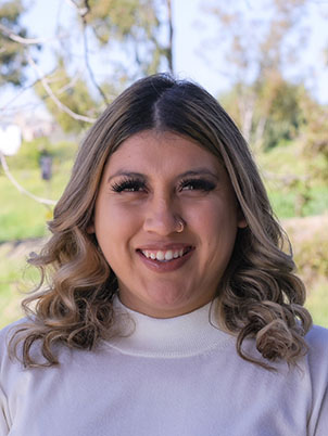 Woman smiling for portrait photo.