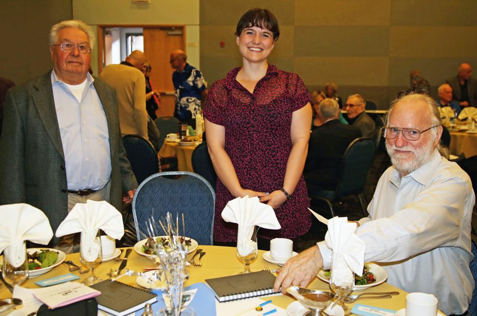 Joe Casanava, leah zeller,& Bill Darrough around table before event