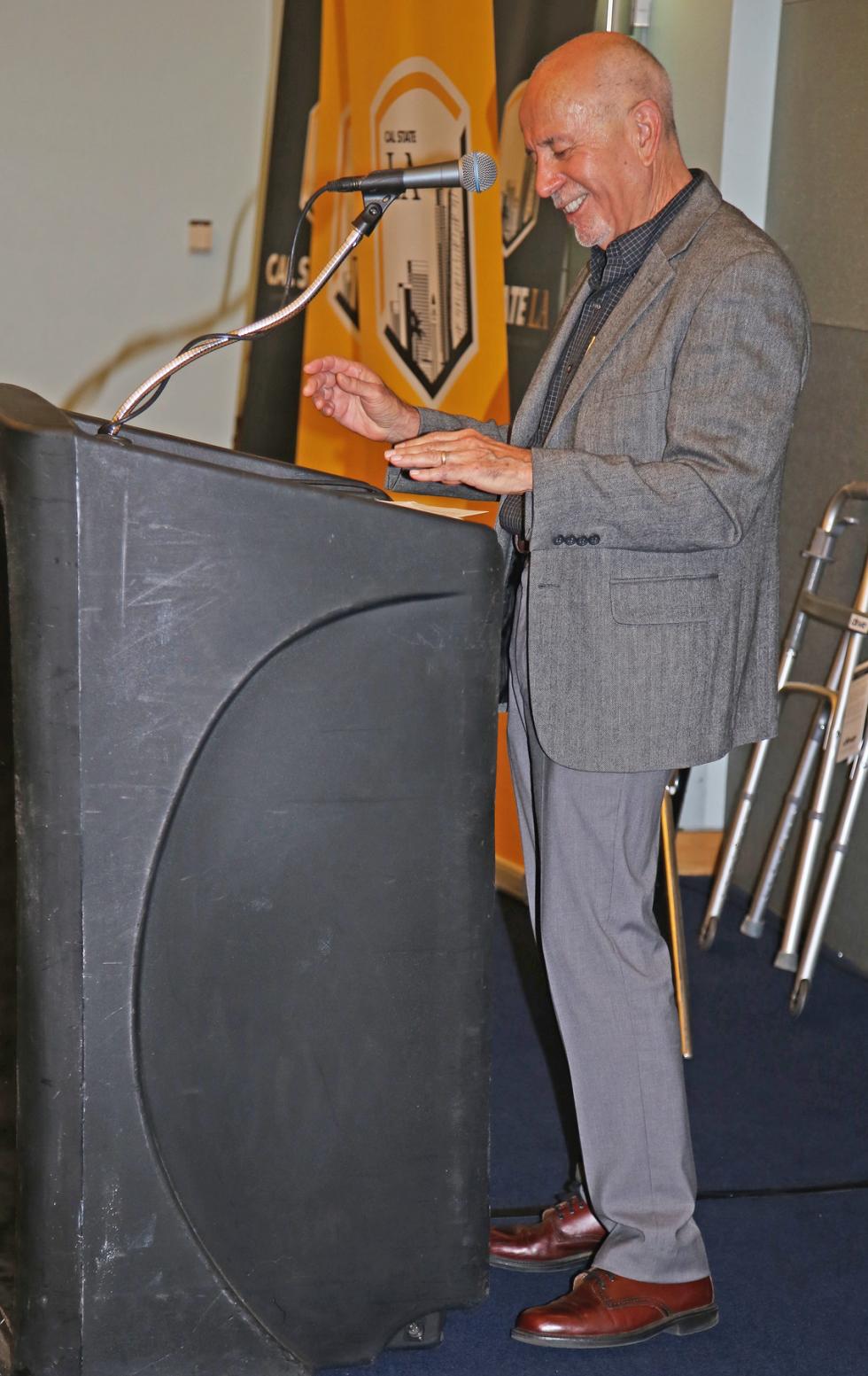 Allfredo Gonzalez at podium