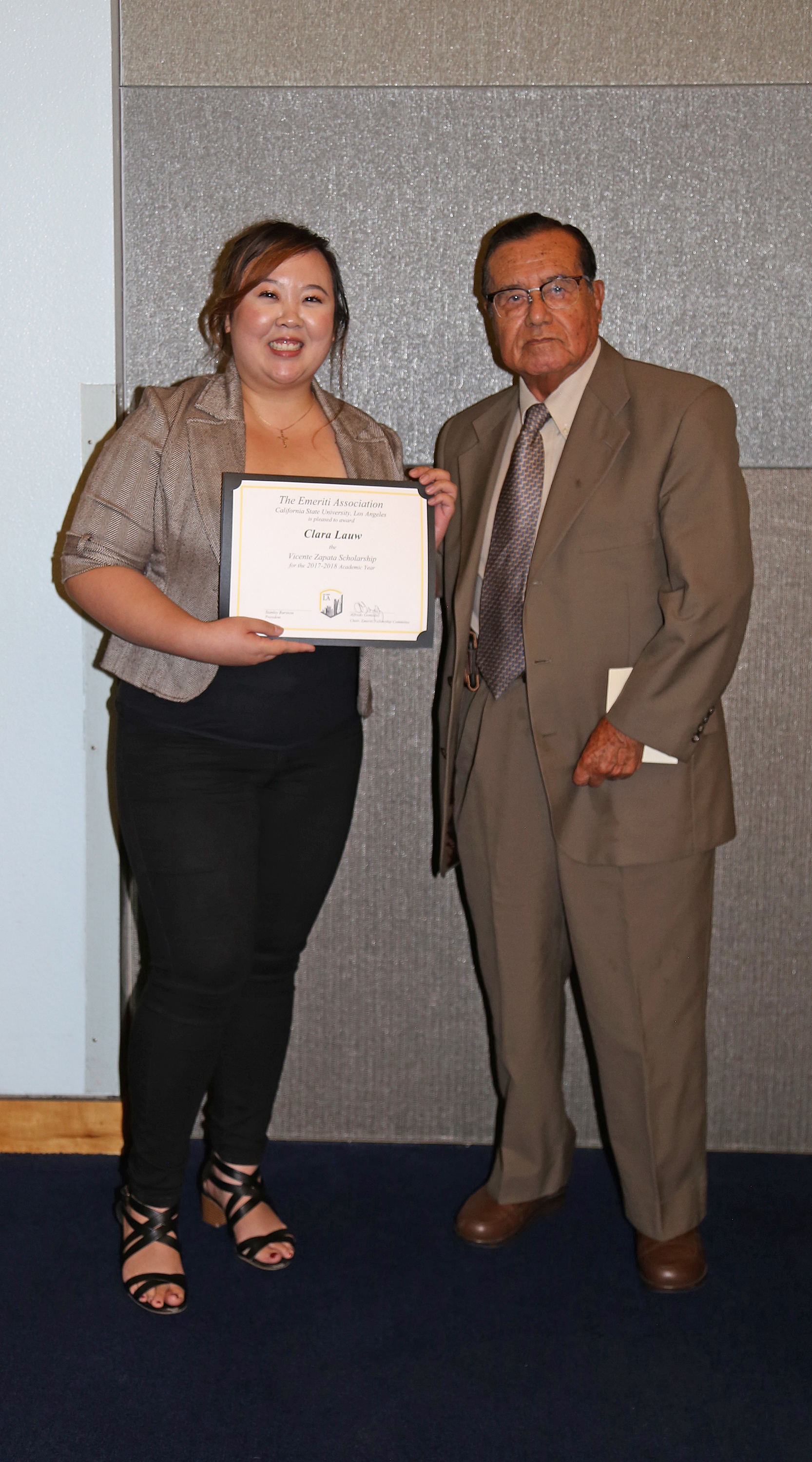 Clara Law and professor at podium at fall 2017 luncheon