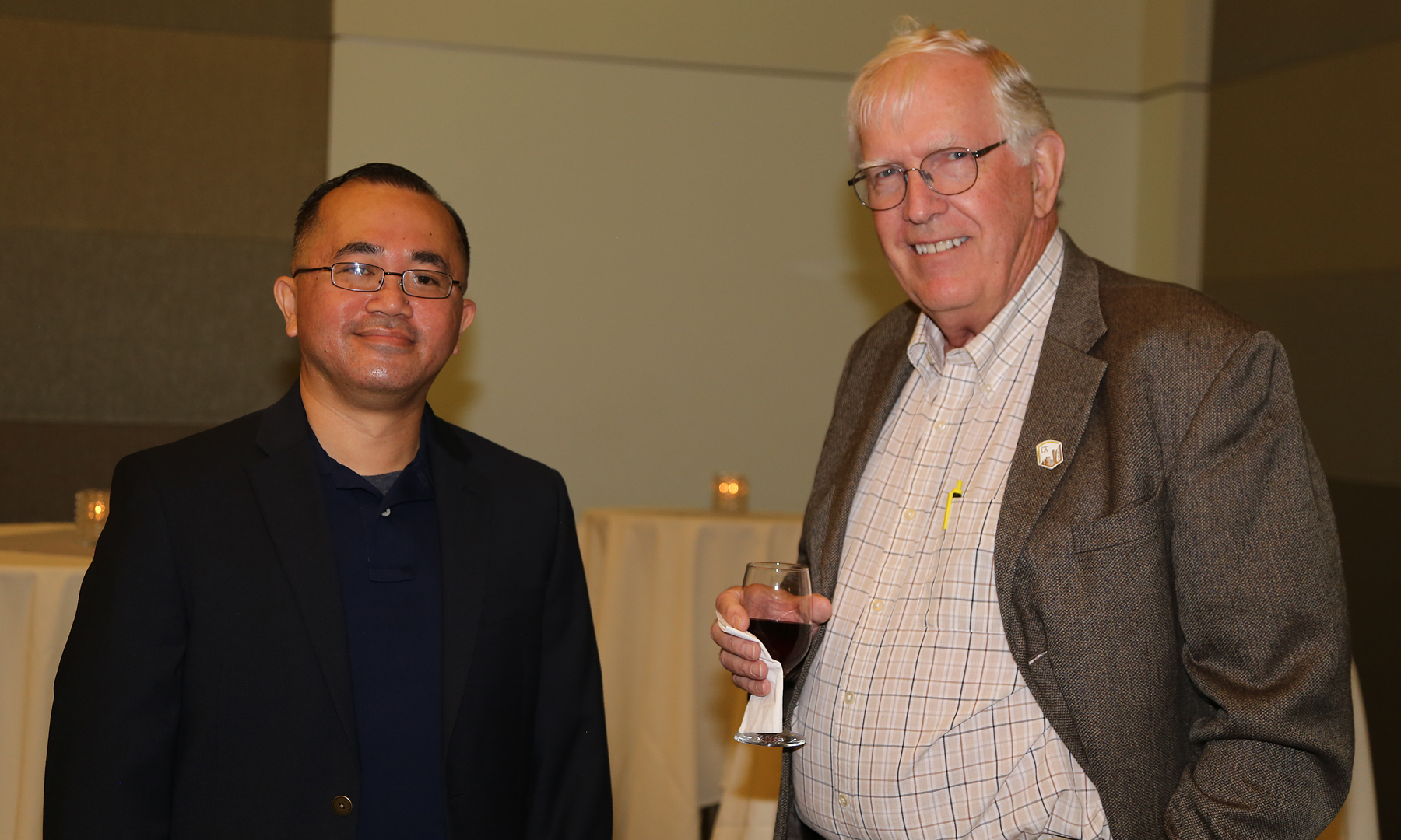 Student and professor at fall luncheon