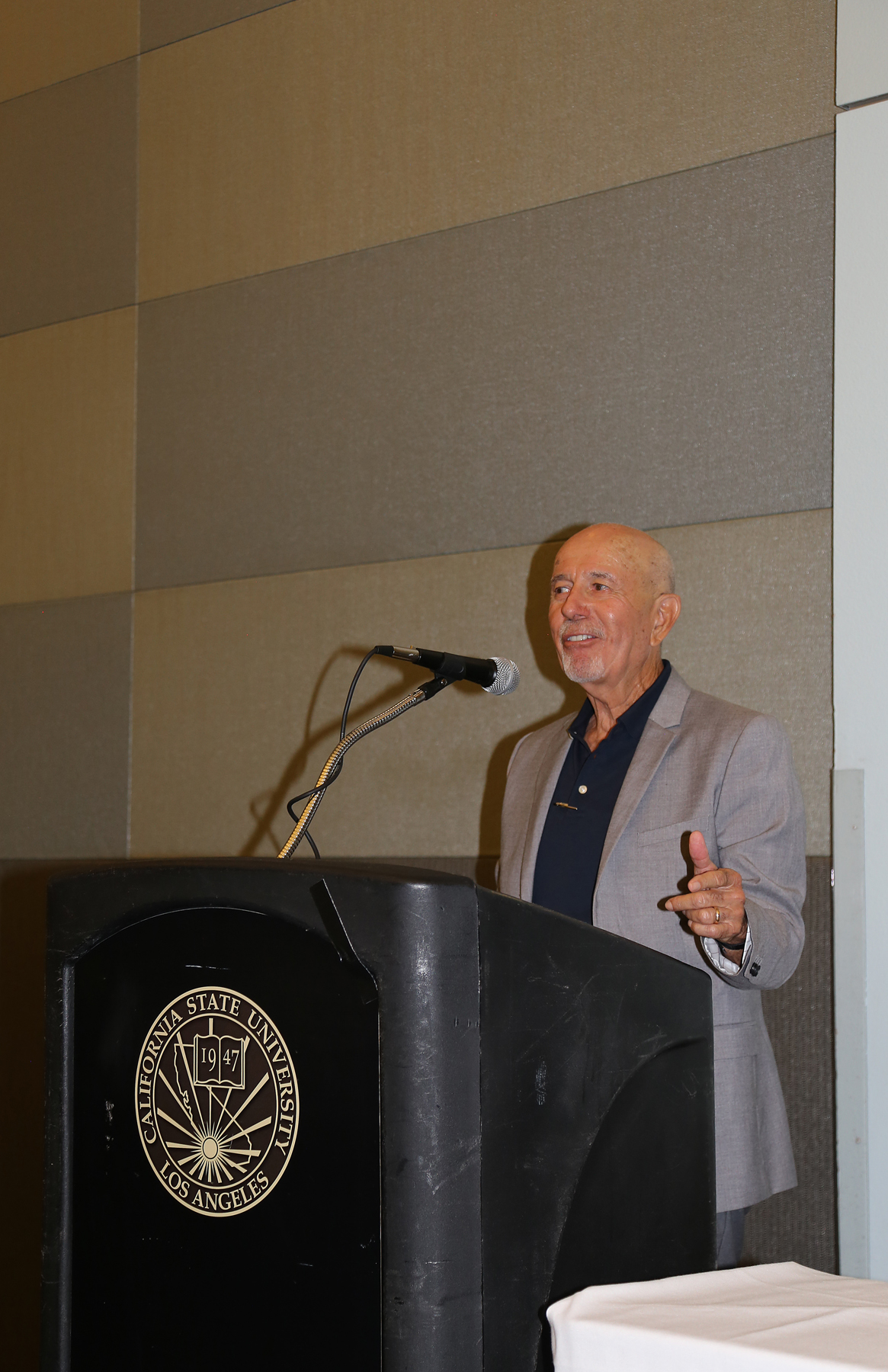 speaker at podium at fall luncheon