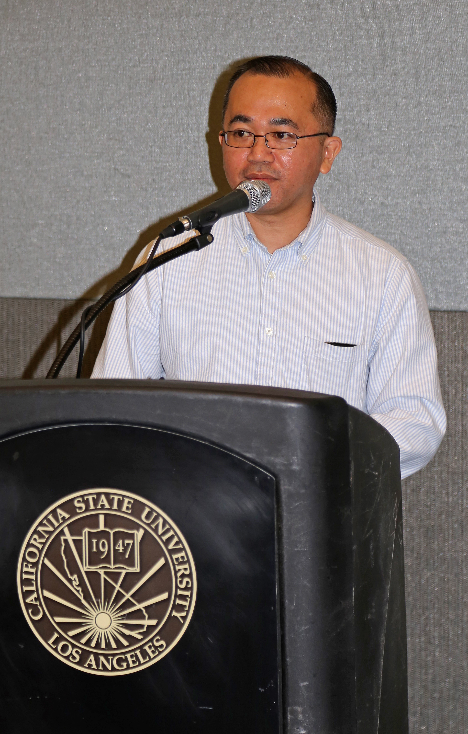 student at podium at fall 2017 luncheon