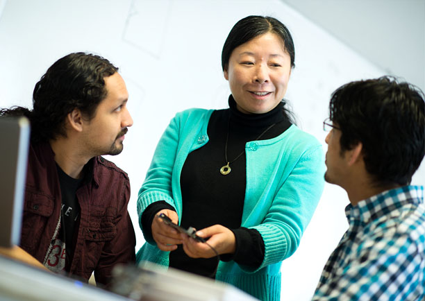 Cal State LA Professor Assisting two students