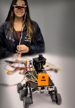 student wears device testing robotic vehicle