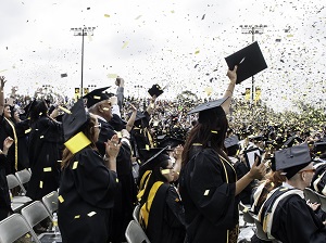 Students celebrate their graduation during ceremony
