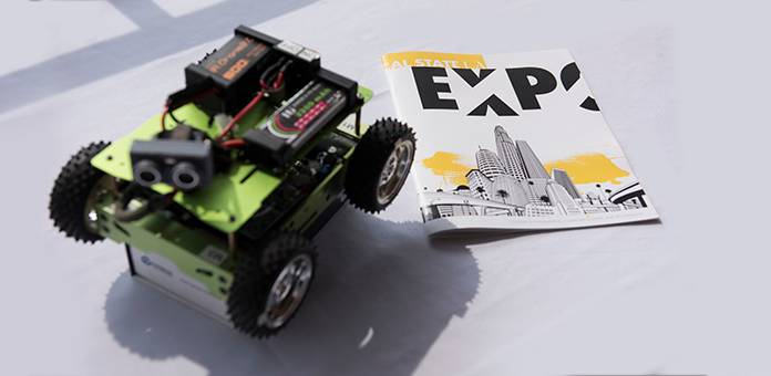 Cal State LA ECST EXPO Catalog with a small mechanical vehicle