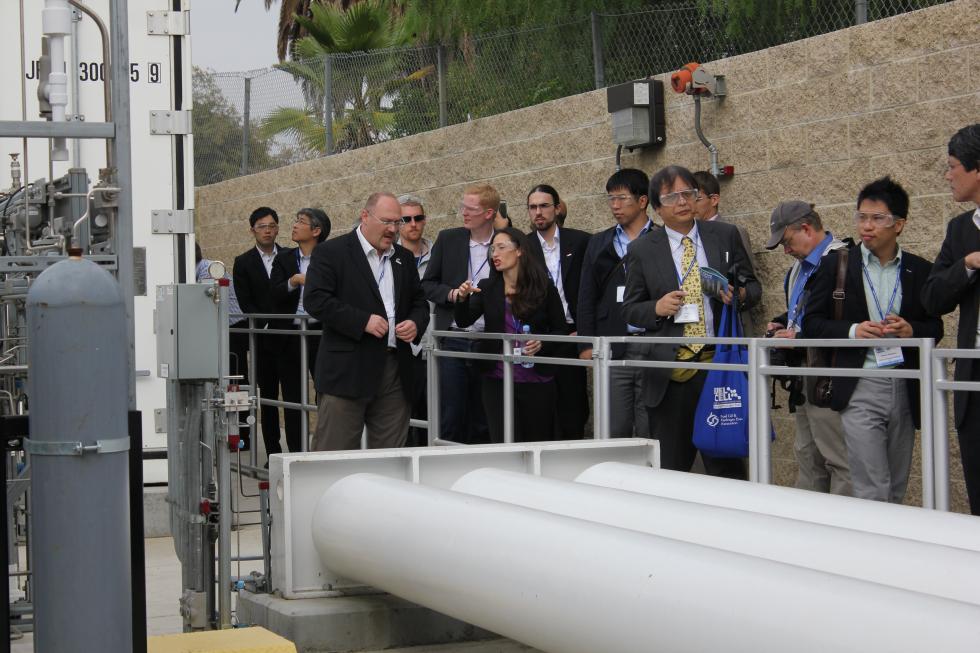 November 2014, Dr. Blekhman is giving a tour of the Hydrogen Station to Fuel Cell Seminar visitors
