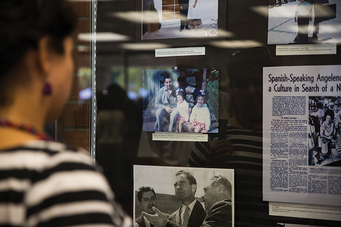 Photo of woman looking at exhibit