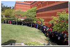 Faculty, dressed in academic regalia, line up for the procession at the Investiture ceremony on May 9.
