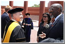 President William A. Covino accepts well-wishes from guests after the Investiture.