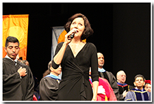 Alumna Renee Souse, of the LA Opera, sings the National Anthem.