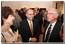 Dr. Debbie Covino, left, and President William A. Covino, center, talk with former president of Fresno State, John Welty, at a pre-reception for the Investiture ceremony on May 9.