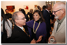 President William A. Covino talks with alumni Rosie and David McNutt at the pre-reception for the Investiture ceremony on May 9.