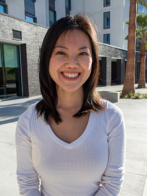 person smiling slightly