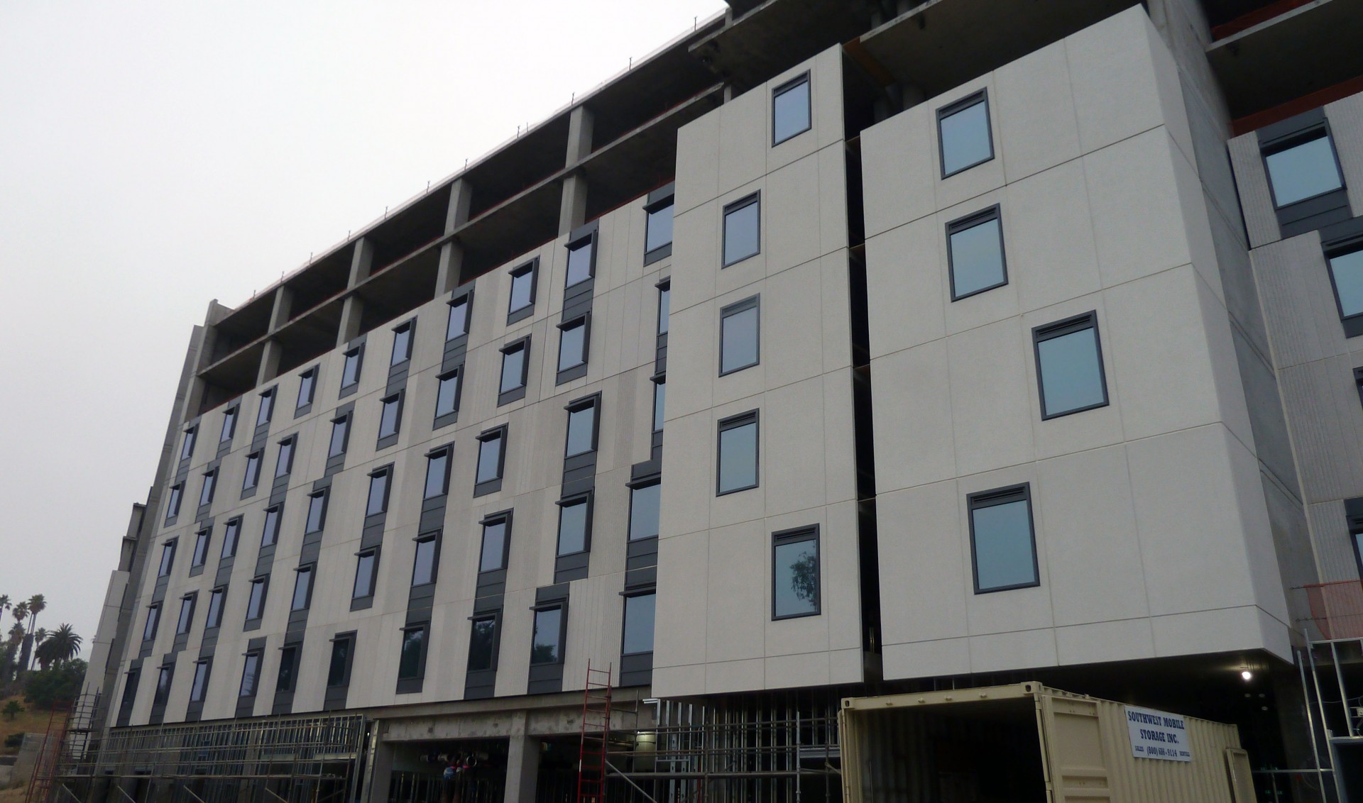 facade and windows of housing building under construction