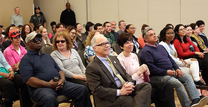 President Covino and First Lady listens to Mind Matters lecture.