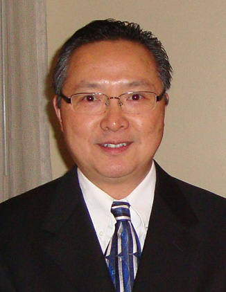 Portrait of Dr Howard Xu taken at the award ceremony