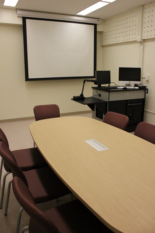 Students should be seated at the conference table